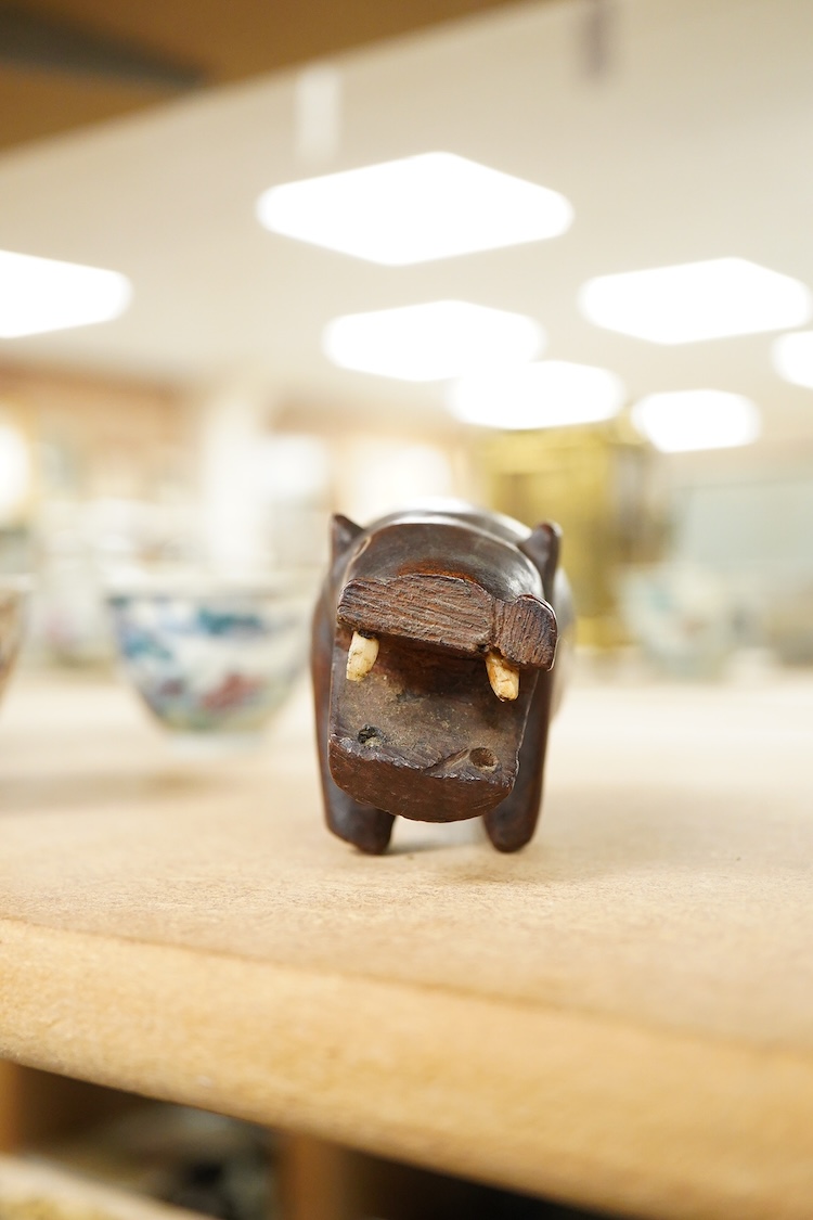 An African carved hardwood model of a hippopotamus, 9cm